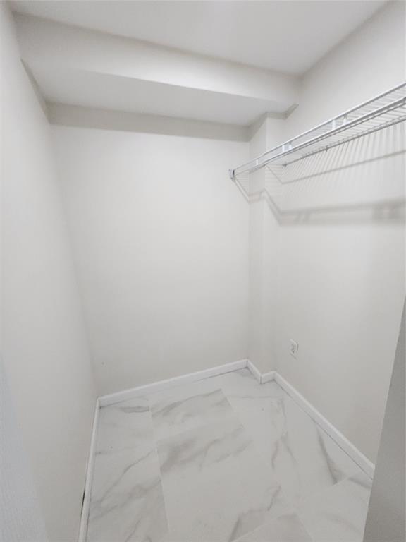 485 North Pine Island Road, Unit 204 Fort Lauderdale, FL 33324 - Photo 10 of 14 a view of a room with racks on the wall