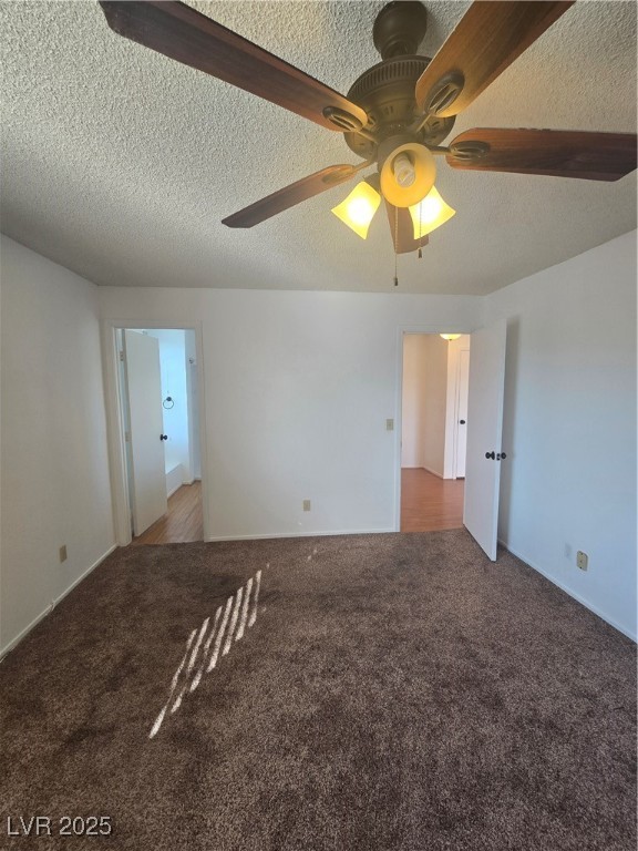 2232 Aspen Mirror Way, Unit 204 Laughlin, NV 89029 - Photo 19 of 37 Unfurnished room with carpet flooring, a ceiling fan, and a textured ceiling