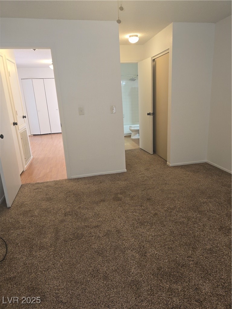 2232 Aspen Mirror Way, Unit 204 Laughlin, NV 89029 - Photo 20 of 37 Empty room featuring carpet and baseboards