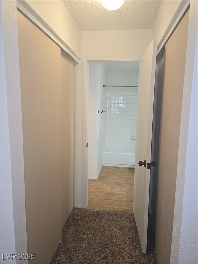 2232 Aspen Mirror Way, Unit 204 Laughlin, NV 89029 - Photo 23 of 37 Hallway featuring carpet