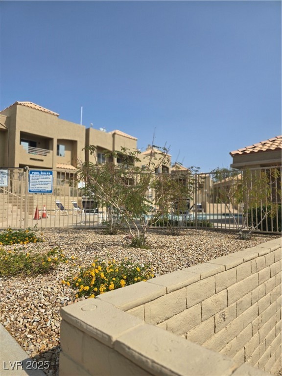 2232 Aspen Mirror Way, Unit 204 Laughlin, NV 89029 - Photo 32 of 37 View of property's community featuring a residential view and fence