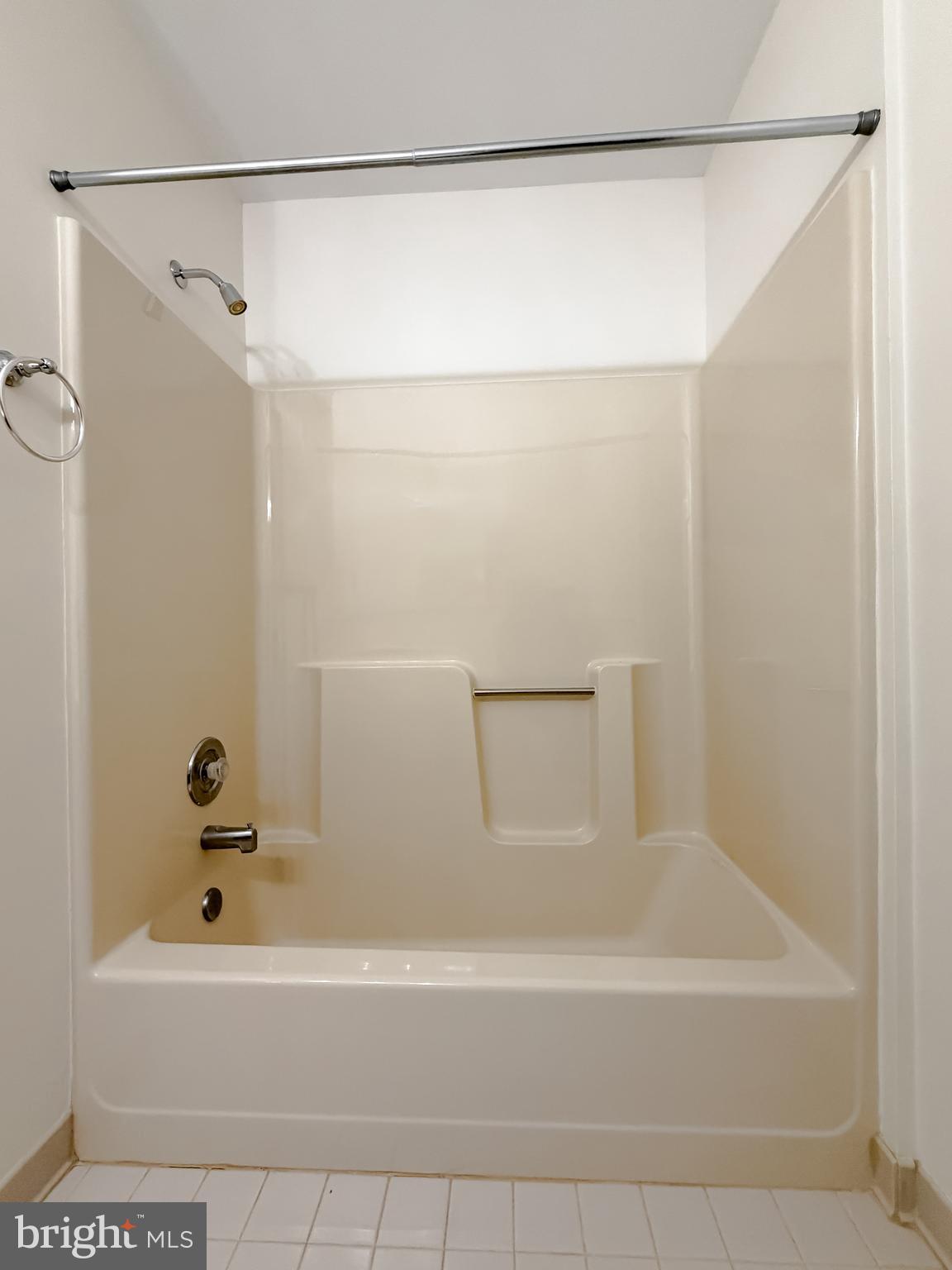7615 Mill Creek Road Benedict, MD 20612 - Photo 25 of 37 a bathroom with a shower and a bath tub