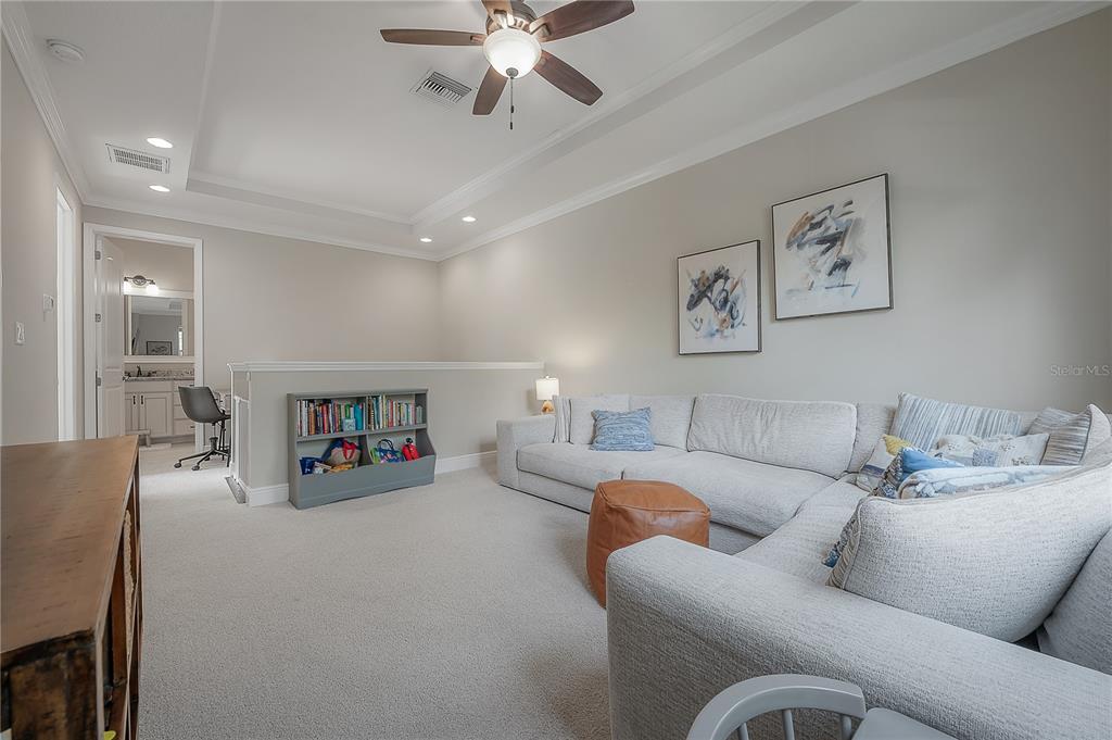 3108 West Villa Rosa Street Tampa, FL 33611 - Photo 38 of 58 a living room with furniture and a flat screen tv