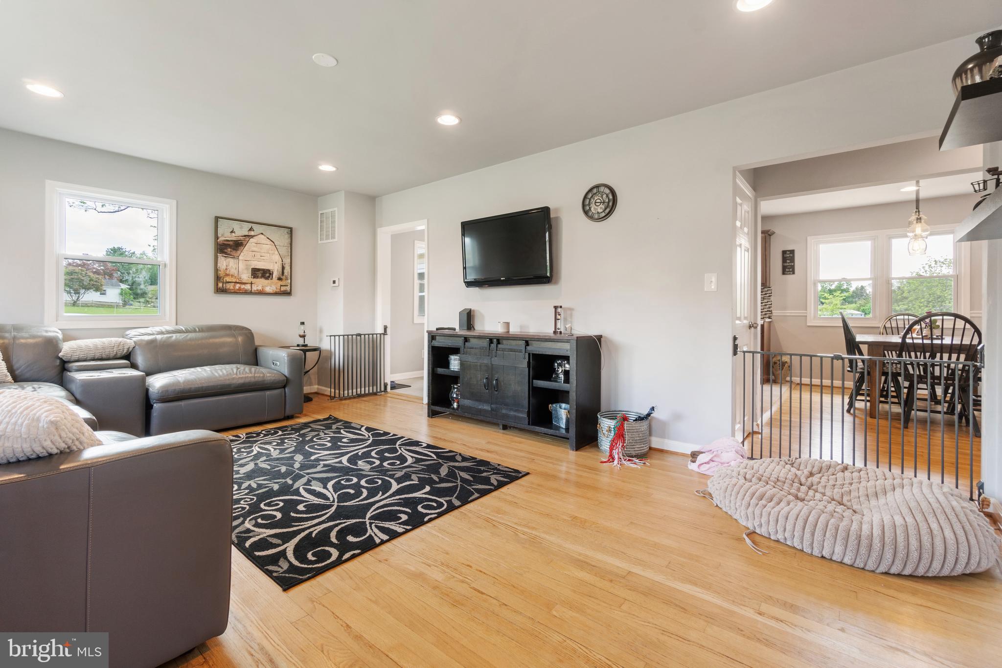 1556 Fairmount Road Hampstead, MD 21074 - Photo 11 of 48 a living room with furniture and a flat screen tv