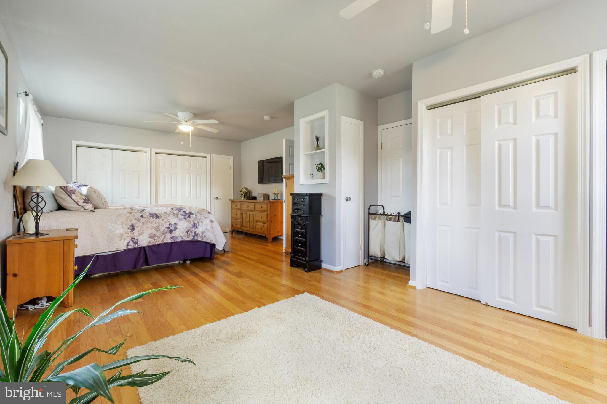 1556 Fairmount Road Hampstead, MD 21074 - Photo 14 of 48 a bedroom with a bed and a walk in closet