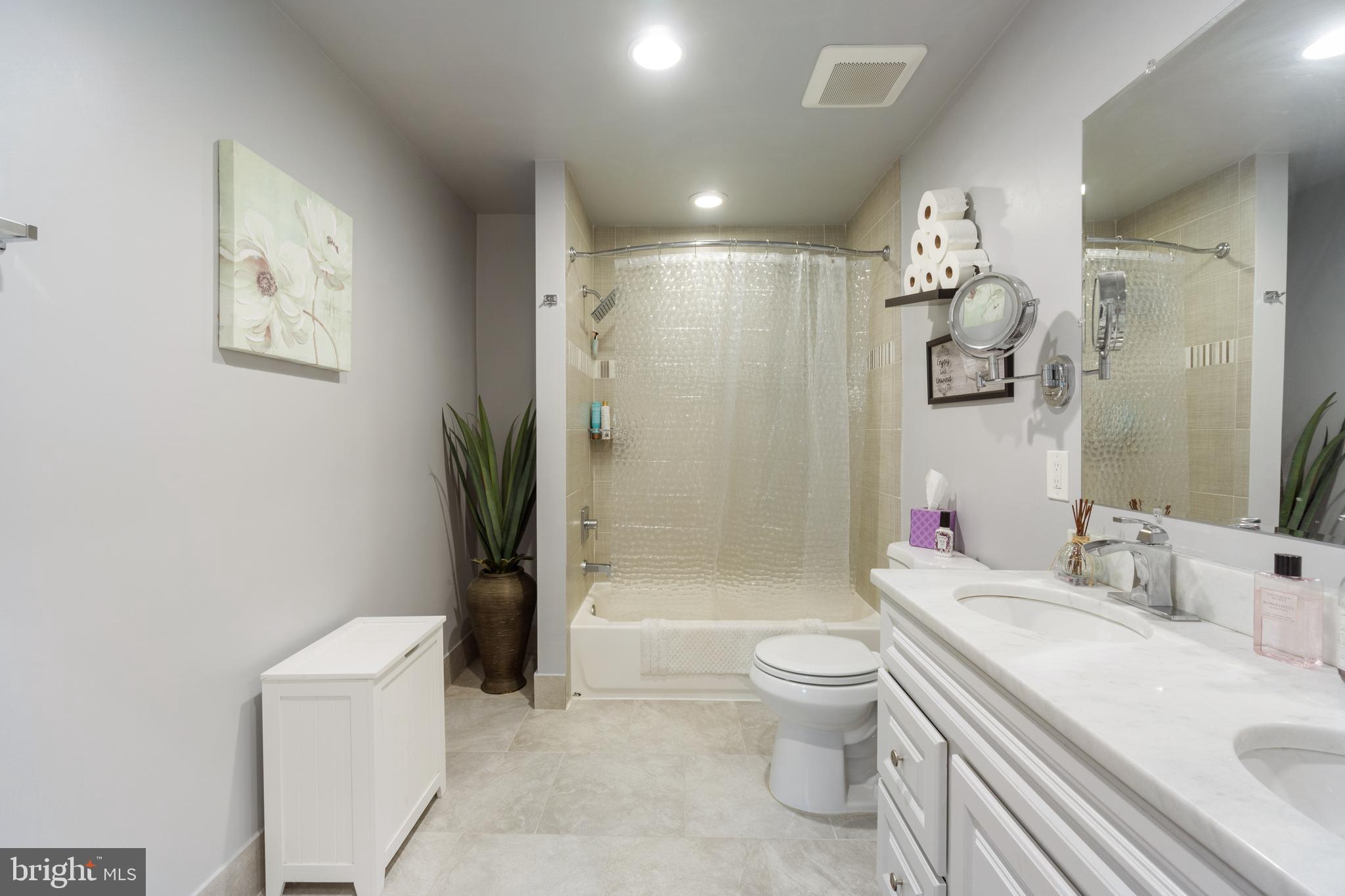 1556 Fairmount Road Hampstead, MD 21074 - Photo 17 of 48 a bathroom with a sink a toilet and shower