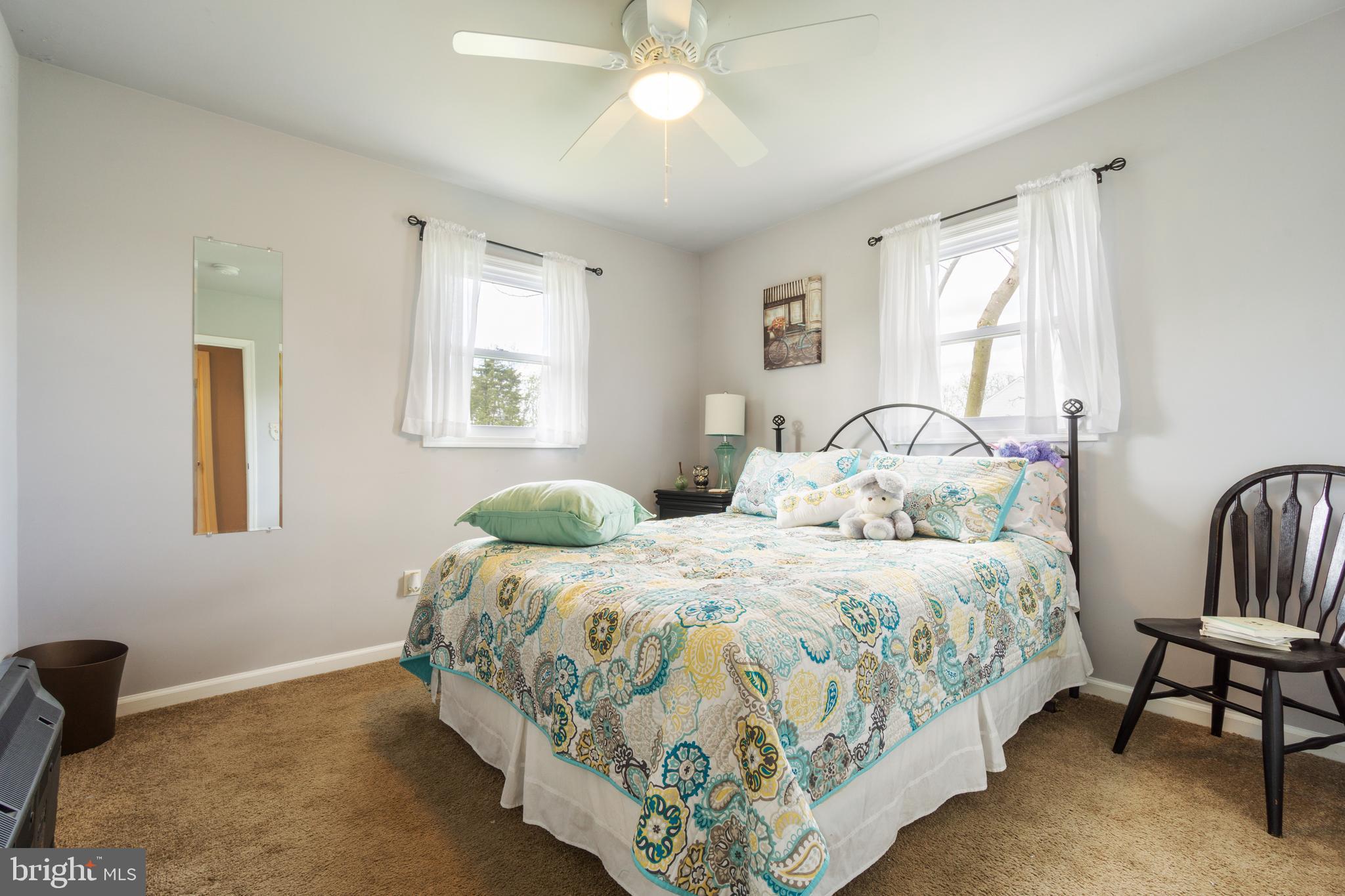 1556 Fairmount Road Hampstead, MD 21074 - Photo 19 of 48 a bedroom with a bed and a window