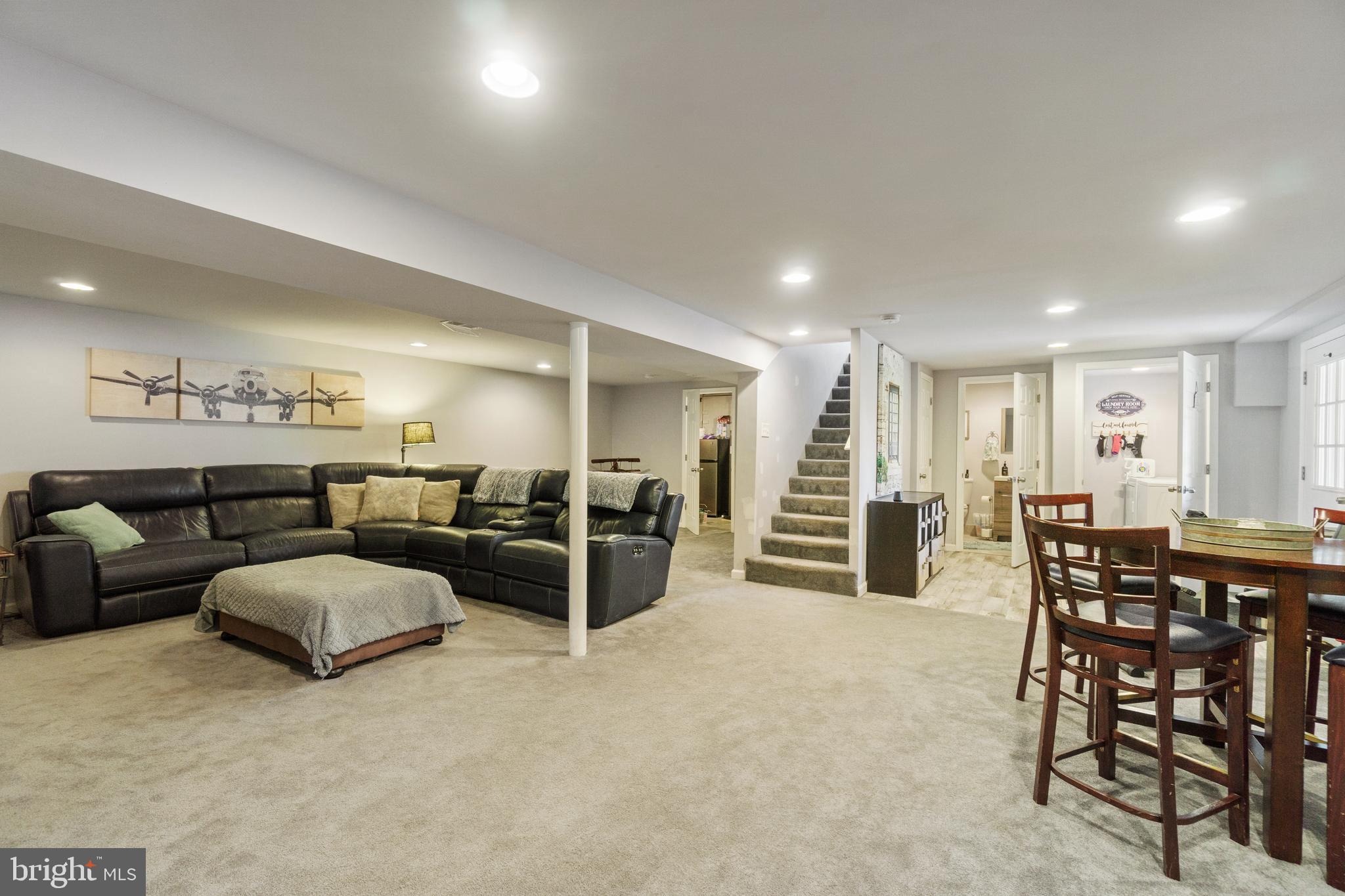 1556 Fairmount Road Hampstead, MD 21074 - Photo 24 of 48 a living room with furniture and wooden floor