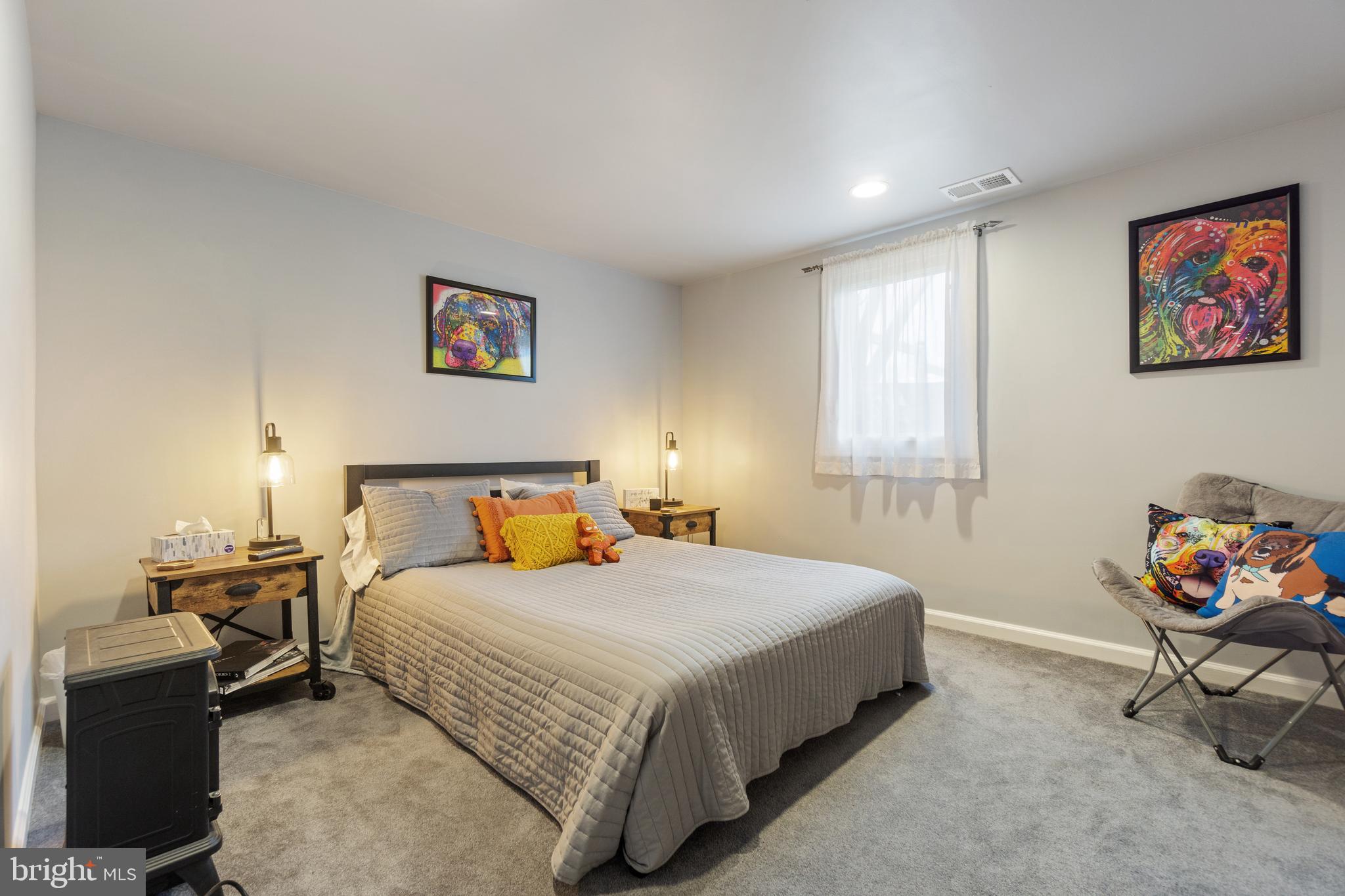 1556 Fairmount Road Hampstead, MD 21074 - Photo 27 of 48 a bedroom with a bed and a window