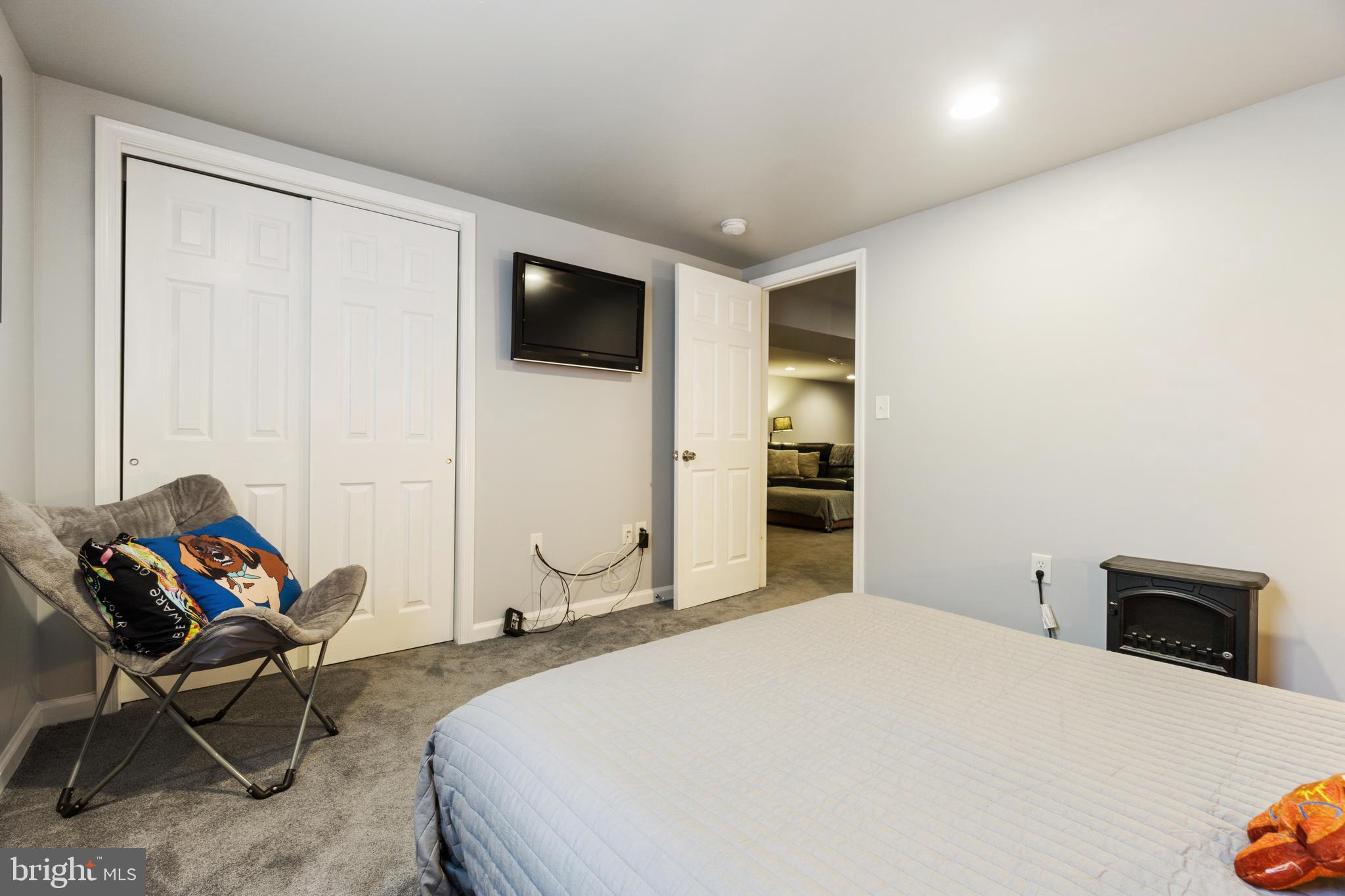 1556 Fairmount Road Hampstead, MD 21074 - Photo 28 of 48 a bedroom with a bed and a chair