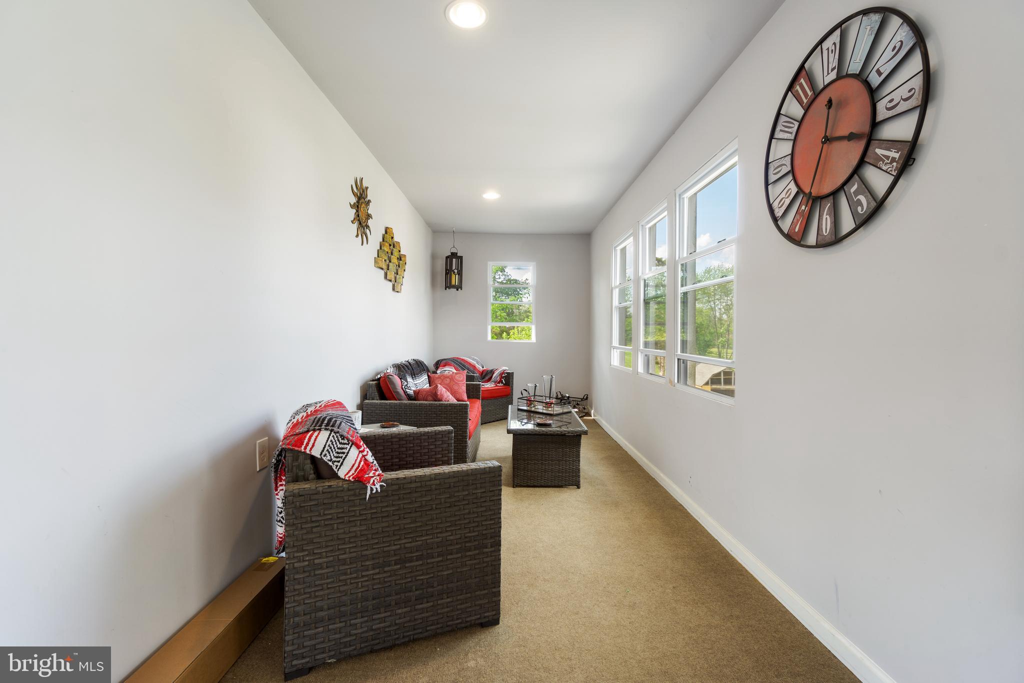 1556 Fairmount Road Hampstead, MD 21074 - Photo 32 of 48 a living room with furniture and a window