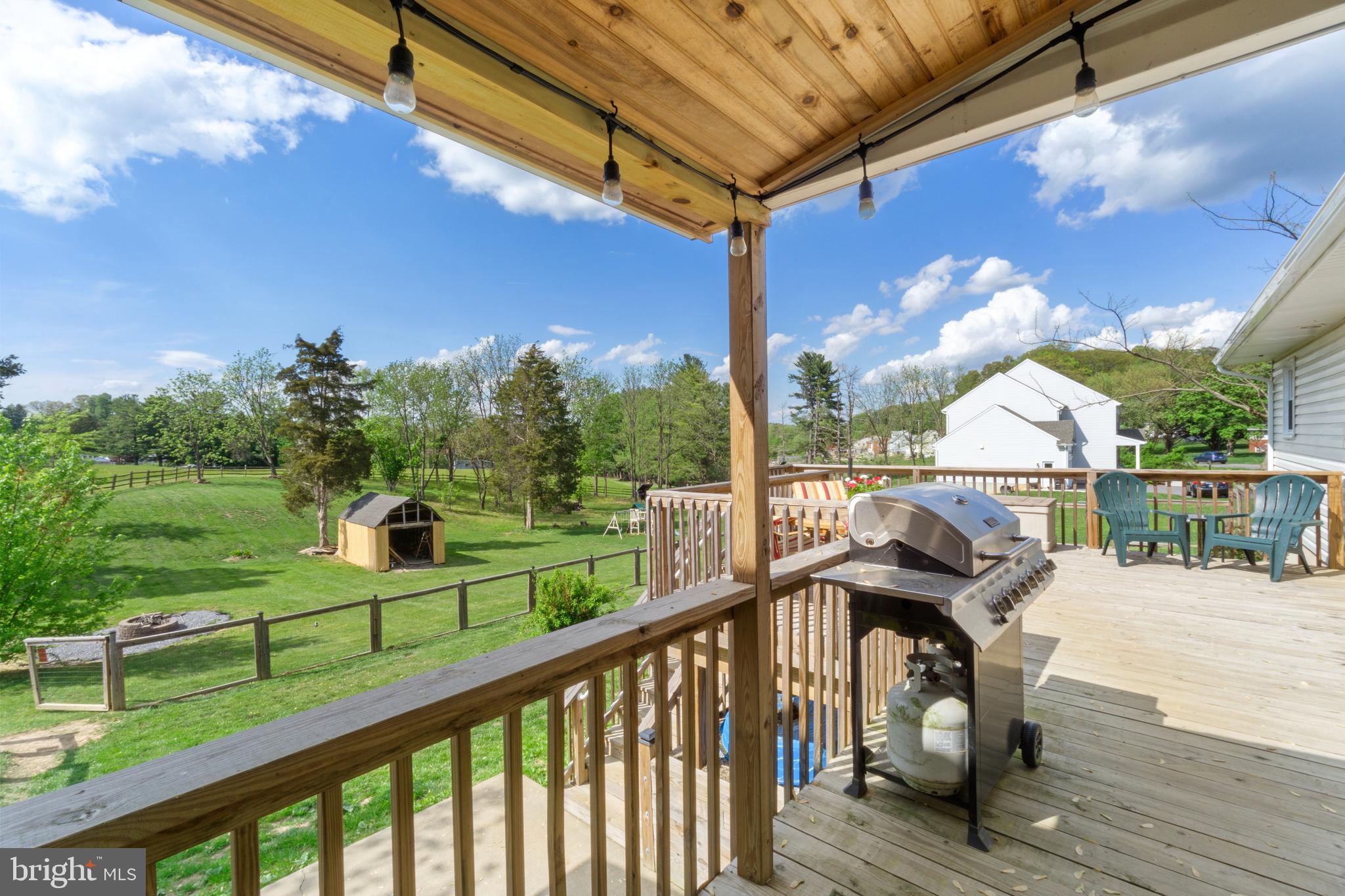 1556 Fairmount Road Hampstead, MD 21074 - Photo 46 of 48 a view of balcony with couch and wooden fence