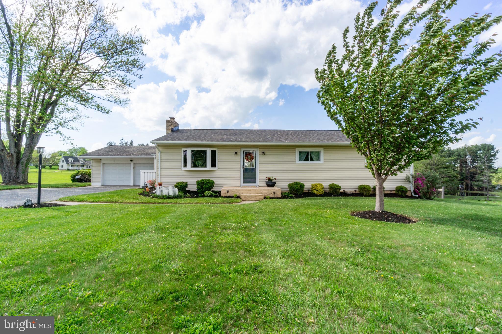 1556 Fairmount Road Hampstead, MD 21074 - Photo 47 of 48 a front view of a house with a yard and trees