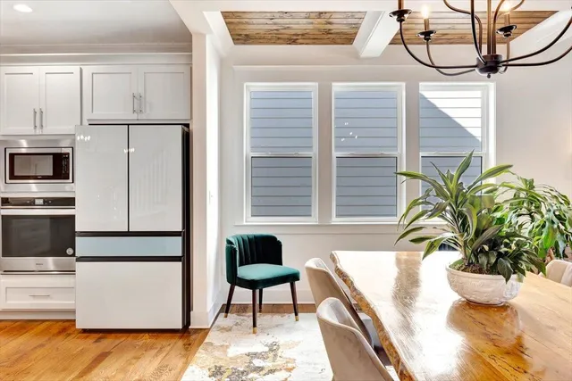 a view of a living room and dining room