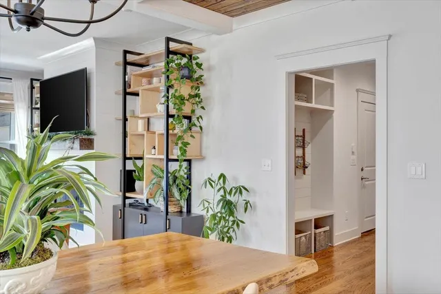 a view of a livingroom with furniture and front door
