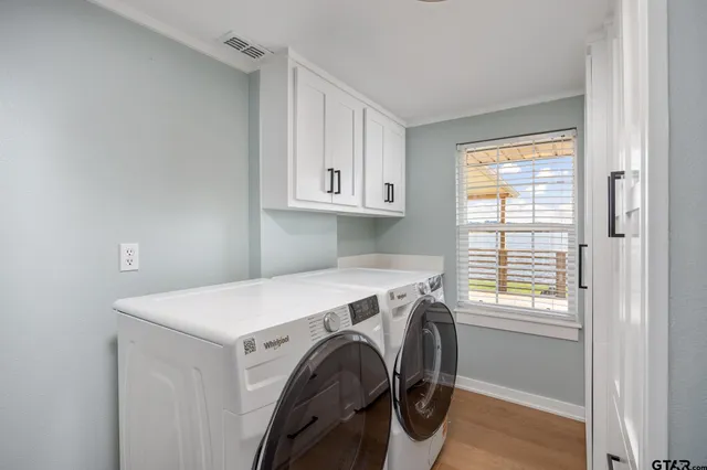 a utility room with dryer and washer