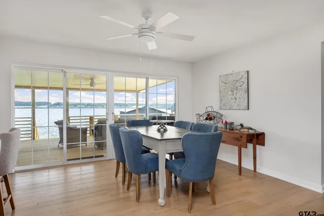 a view of a dining room with furniture window and outside view