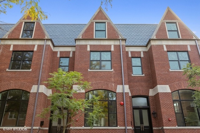 507 West Menomonee Street Chicago, IL 60614 - Photo 2 of 18 front view of a brick house with large windows