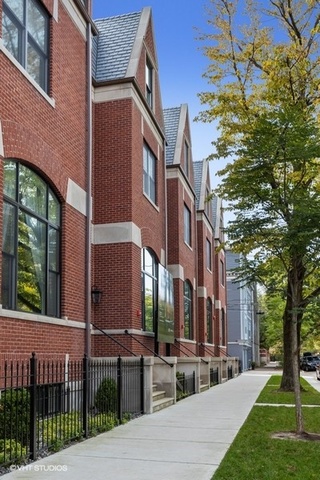 507 West Menomonee Street Chicago, IL 60614 - Photo 17 of 18 a front view of a building with yard