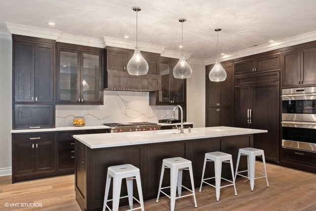 507 West Menomonee Street Chicago, IL 60614 - Photo 6 of 18 a kitchen with a table and chairs in it