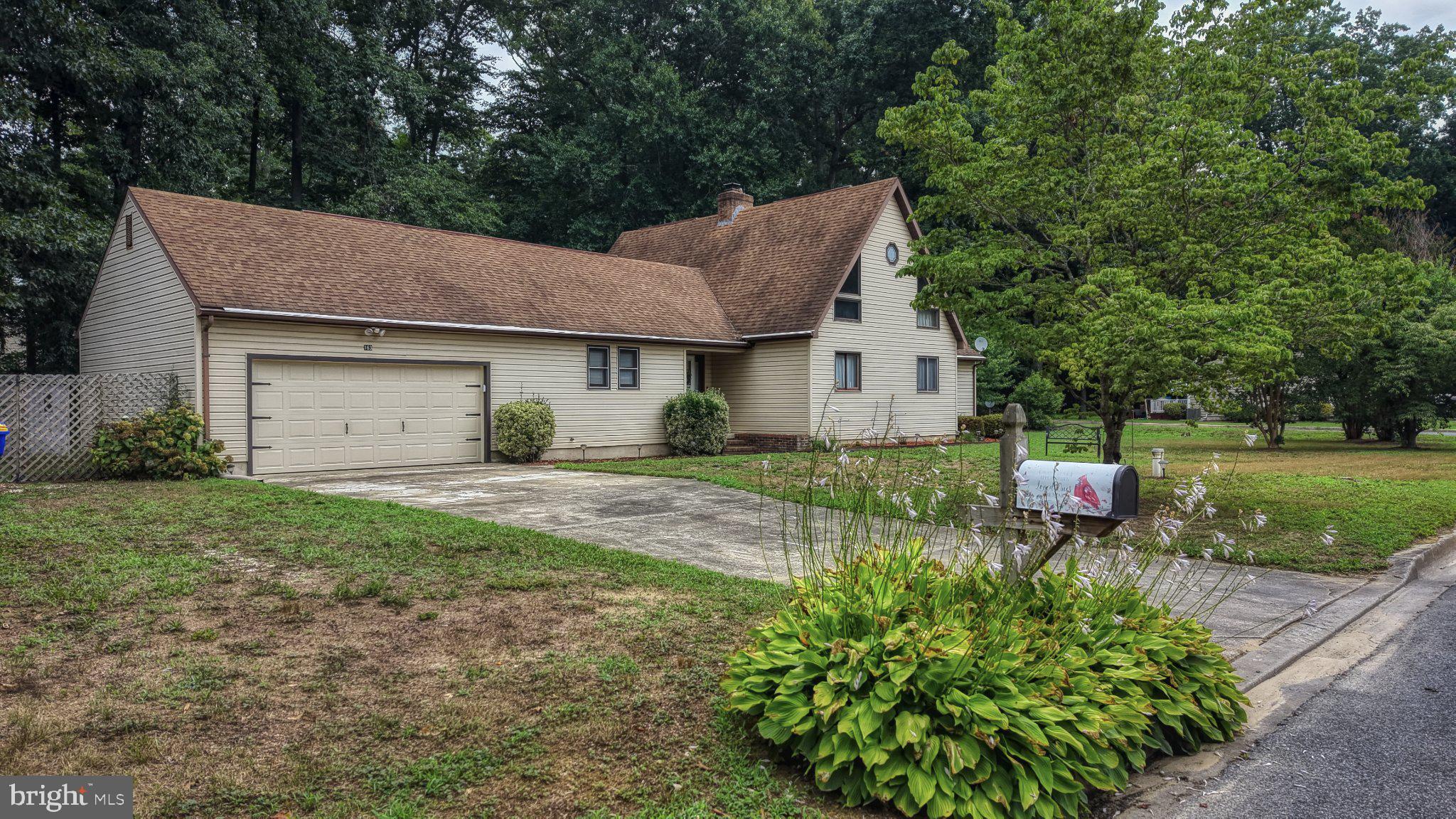 163 Pratts Branch Road Felton, DE 19943 - Photo 45 of 55 Charming home with lush greenery.