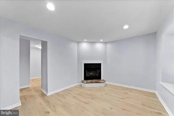 a view of a livingroom with a fireplace