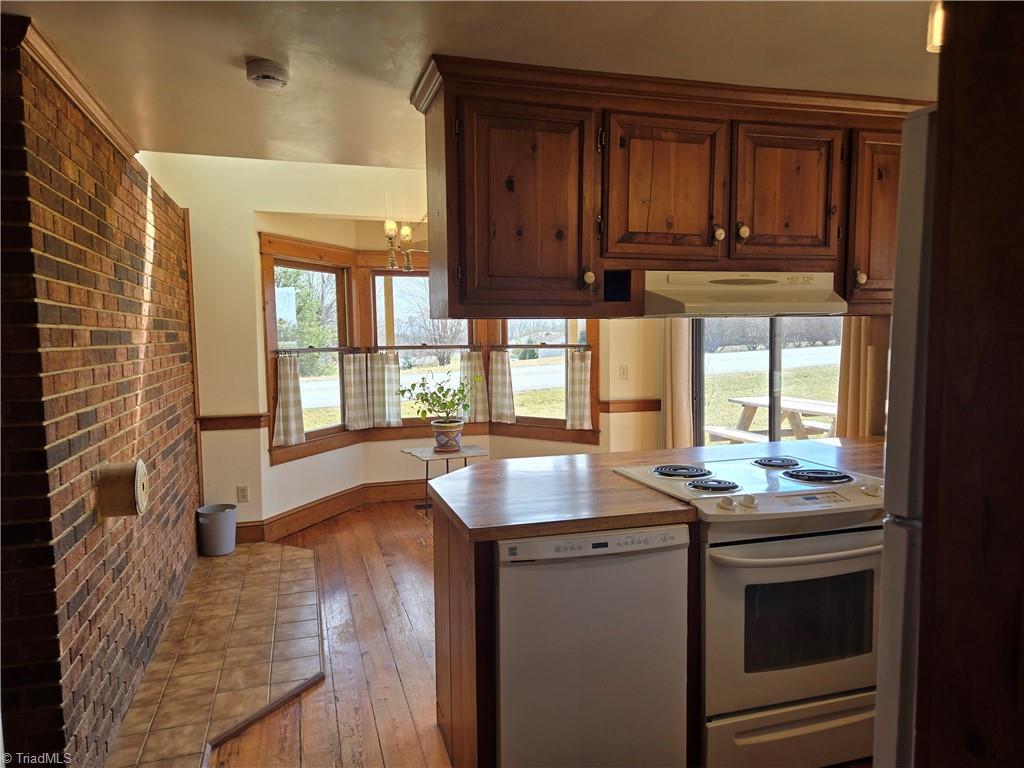 1077 Flat Shoals Road King, NC 27021 - Photo 13 of 46 View of the bay window and sliding glass doors.