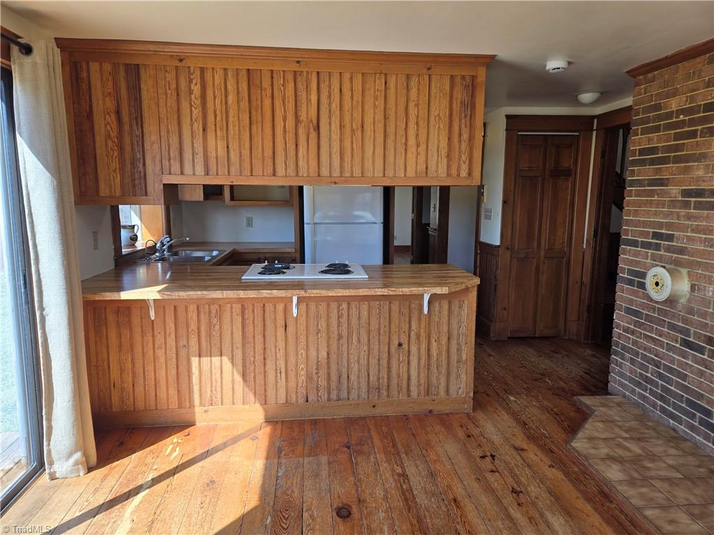 1077 Flat Shoals Road King, NC 27021 - Photo 16 of 46 View of the kitchen with closet on the right.