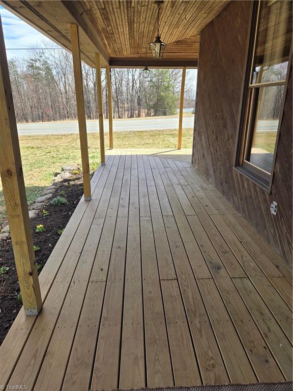 1077 Flat Shoals Road King, NC 27021 - Photo 6 of 46 Wrap around porch