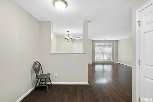 a view of workspace with wooden floor windows