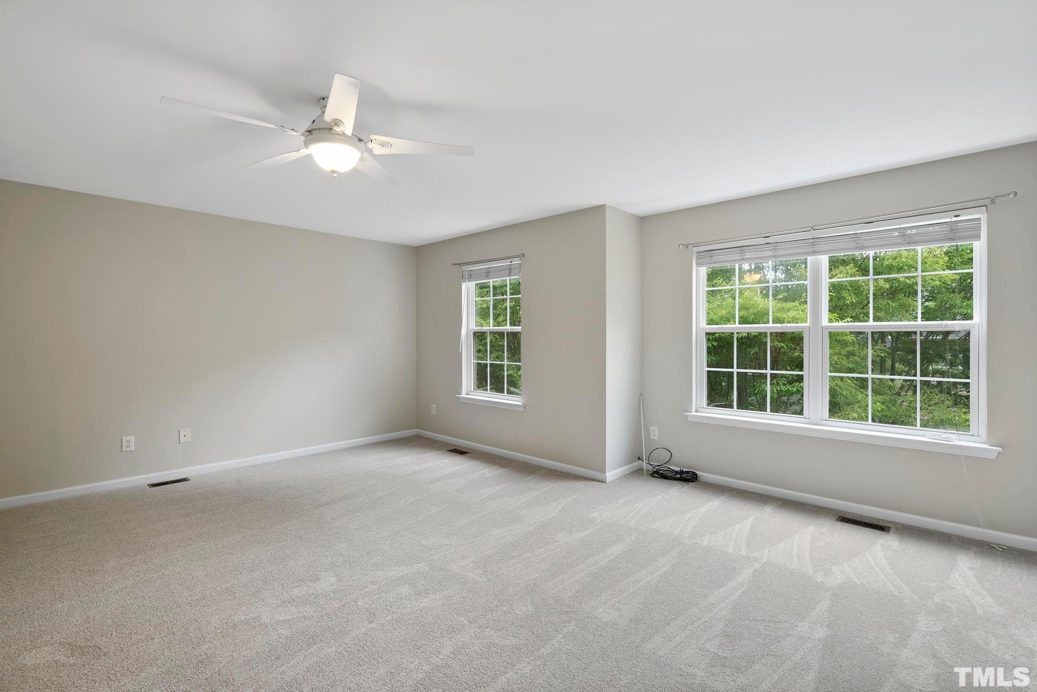 3011 Barrymore Street, Unit 107 Raleigh, NC 27603 - Photo 17 of 33 a view of an empty room with a window