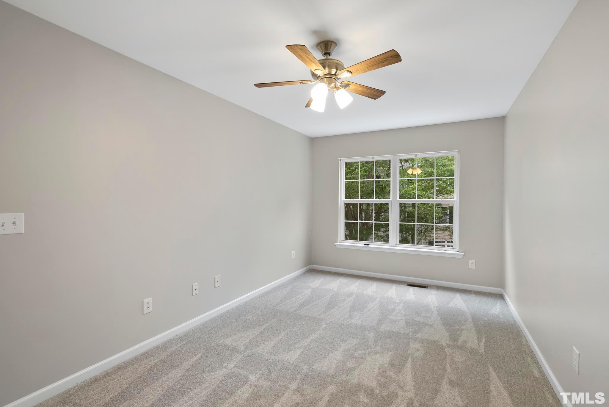 3011 Barrymore Street, Unit 107 Raleigh, NC 27603 - Photo 28 of 33 a view of an empty room with a window
