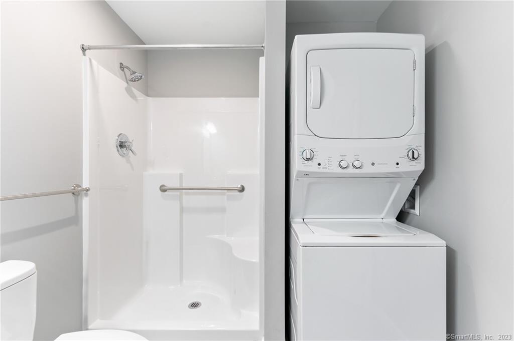 Four Twenty Four Bumper Road Harwinton, CT 06791 - Photo 13 of 28 a bathroom with a shower a mirror and a shower