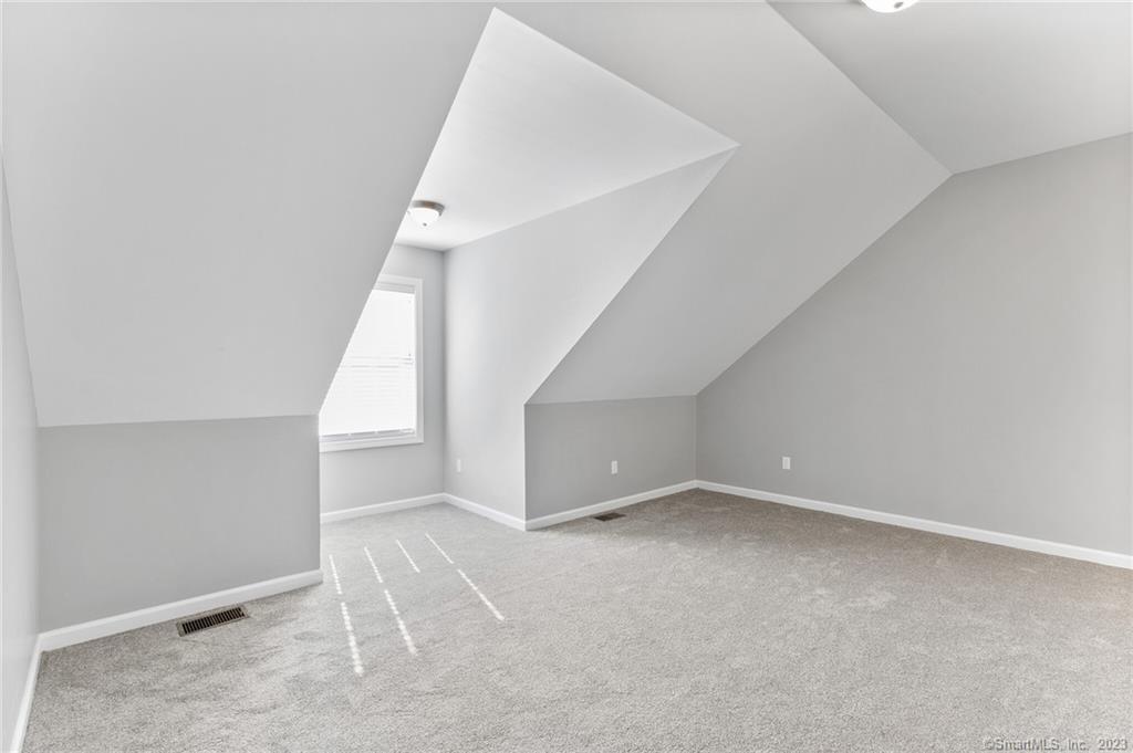 Four Twenty Four Bumper Road Harwinton, CT 06791 - Photo 14 of 28 a view of an empty room with stairs