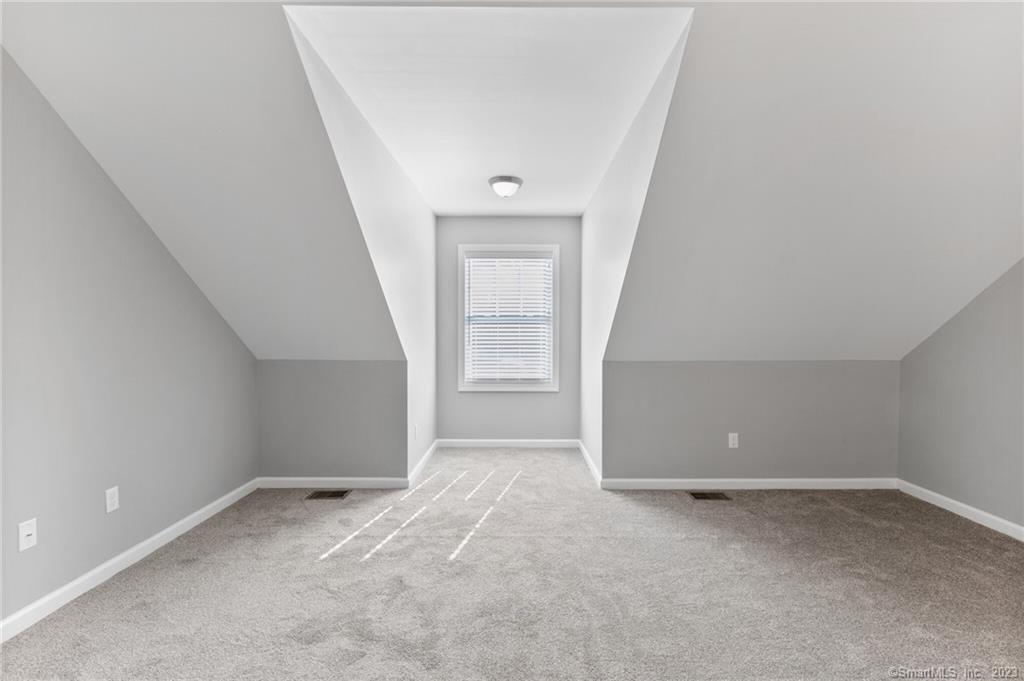 Four Twenty Four Bumper Road Harwinton, CT 06791 - Photo 16 of 28 an empty room with a natural light