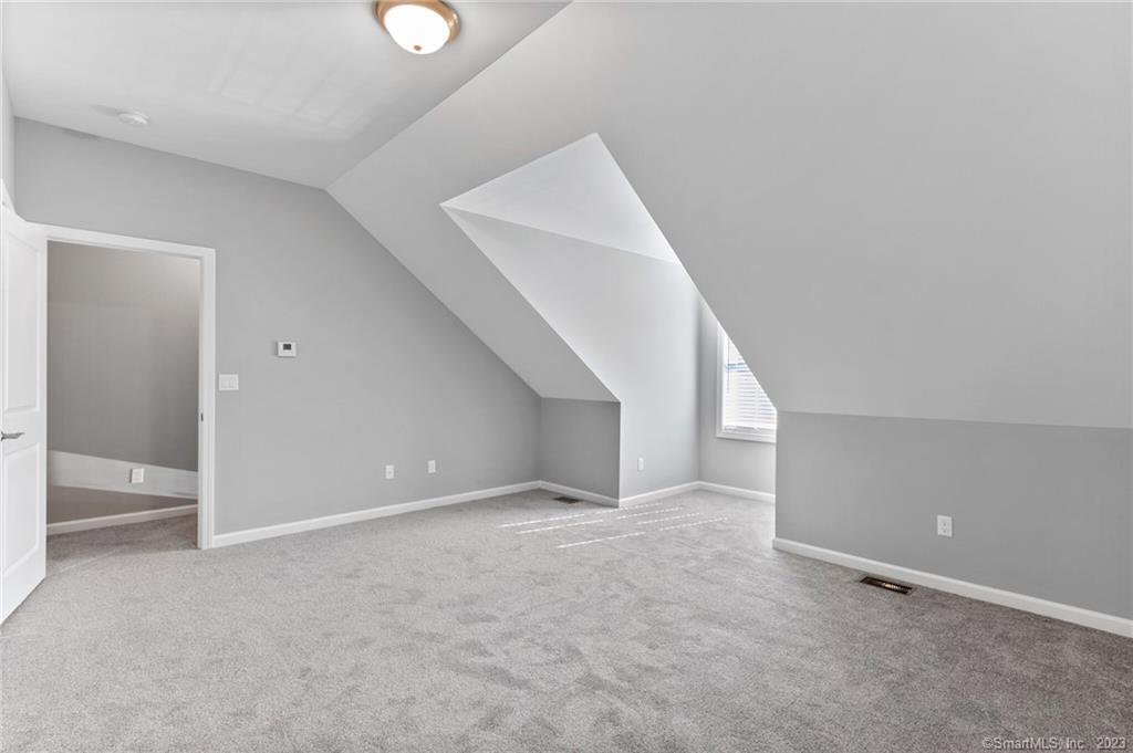 Four Twenty Four Bumper Road Harwinton, CT 06791 - Photo 18 of 28 a view of an empty room with a window