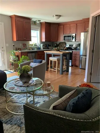 a kitchen with a table and chairs