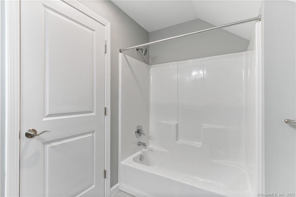 Four Twenty Four Bumper Road Harwinton, CT 06791 - Photo 3 of 28 a bathroom with a bathtub