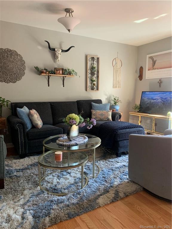 Four Twenty Four Bumper Road Harwinton, CT 06791 - Photo 6 of 28 a living room with furniture and wooden floor