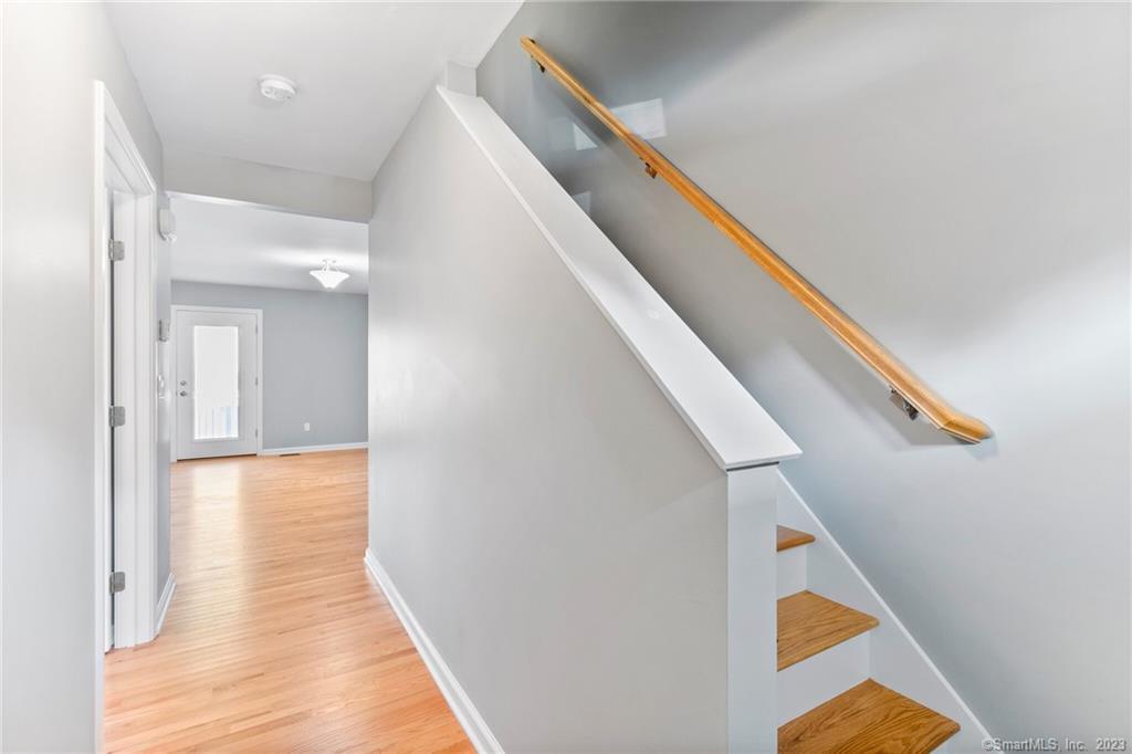 Four Twenty Four Bumper Road Harwinton, CT 06791 - Photo 8 of 28 a view of hallway with wooden floor