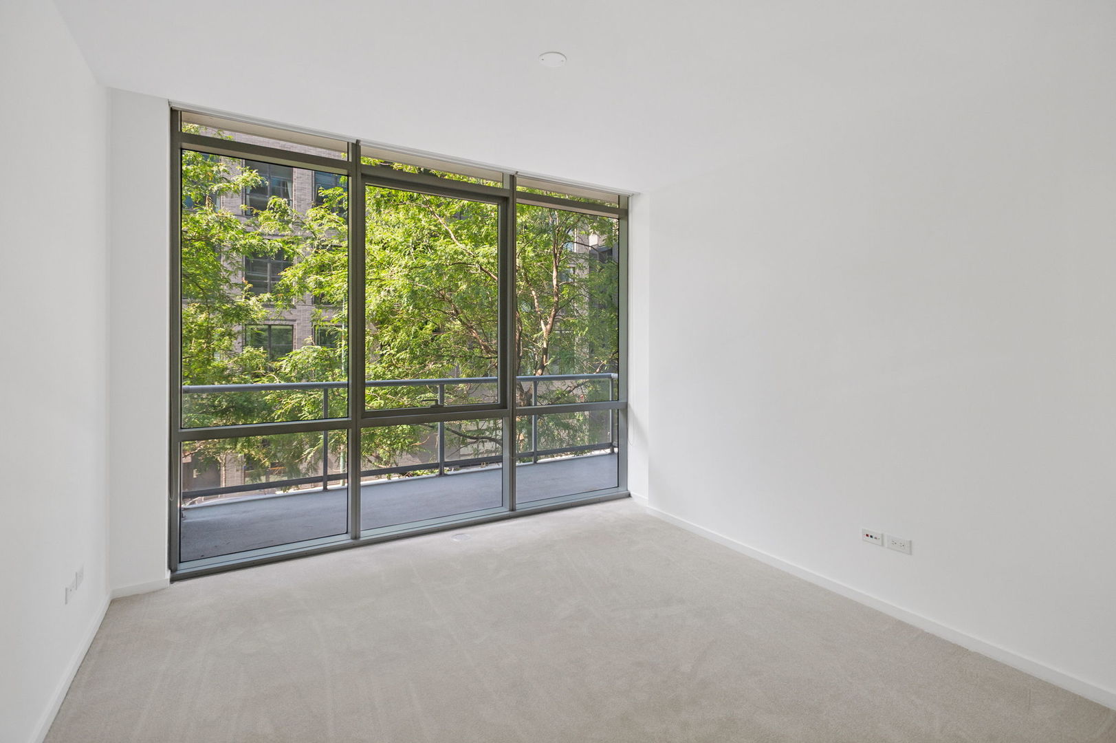 125 South Green Street, Unit 209A Chicago, IL 60607 - Photo 9 of 16 a view of a room with sliding door