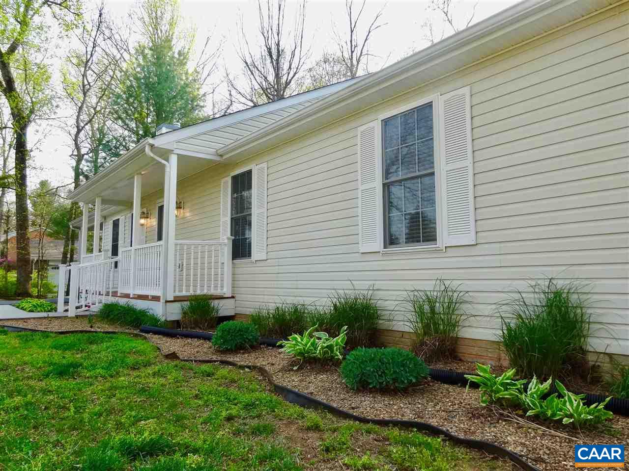 654 Miller School Road Charlottesville, VA 22903 - Photo 1 of 22 a view of a house with a yard and plants
