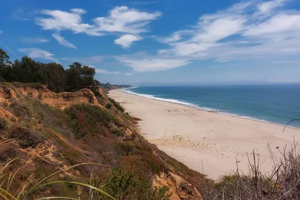 a view of beach and ocean