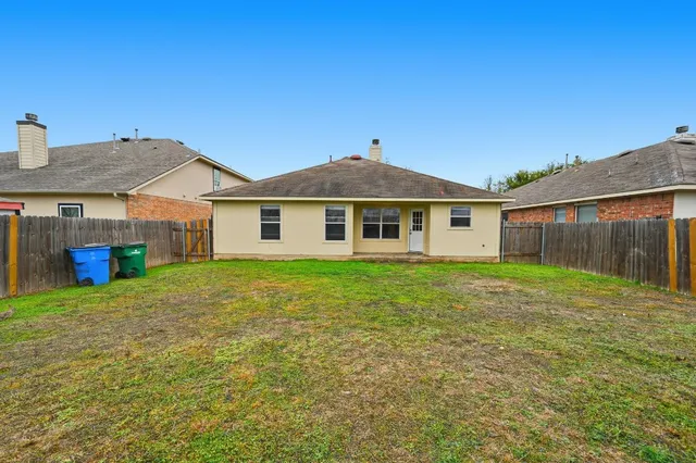 a outdoor space of a house with a garden