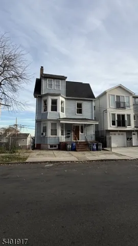 a front view of a building with a street
