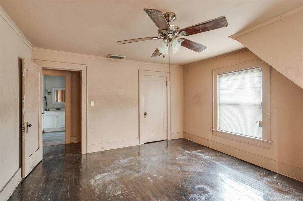 3112 10th Street Wichita Falls, TX 76309 - Photo 21 of 31 an empty room with fan and windows