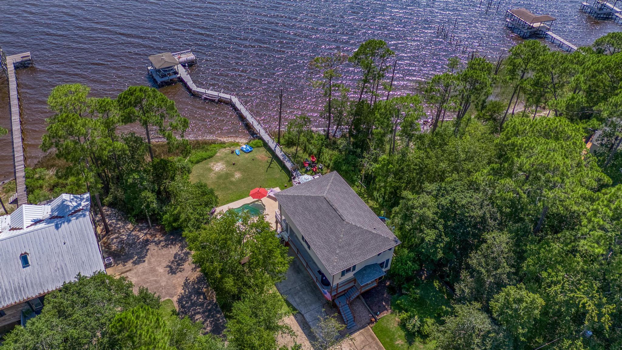7121 Wells Avenue Navarre, FL 32566 - Photo 102 of 125 an aerial view of a house