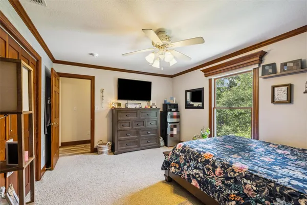 a kitchen with a sink appliances and cabinets