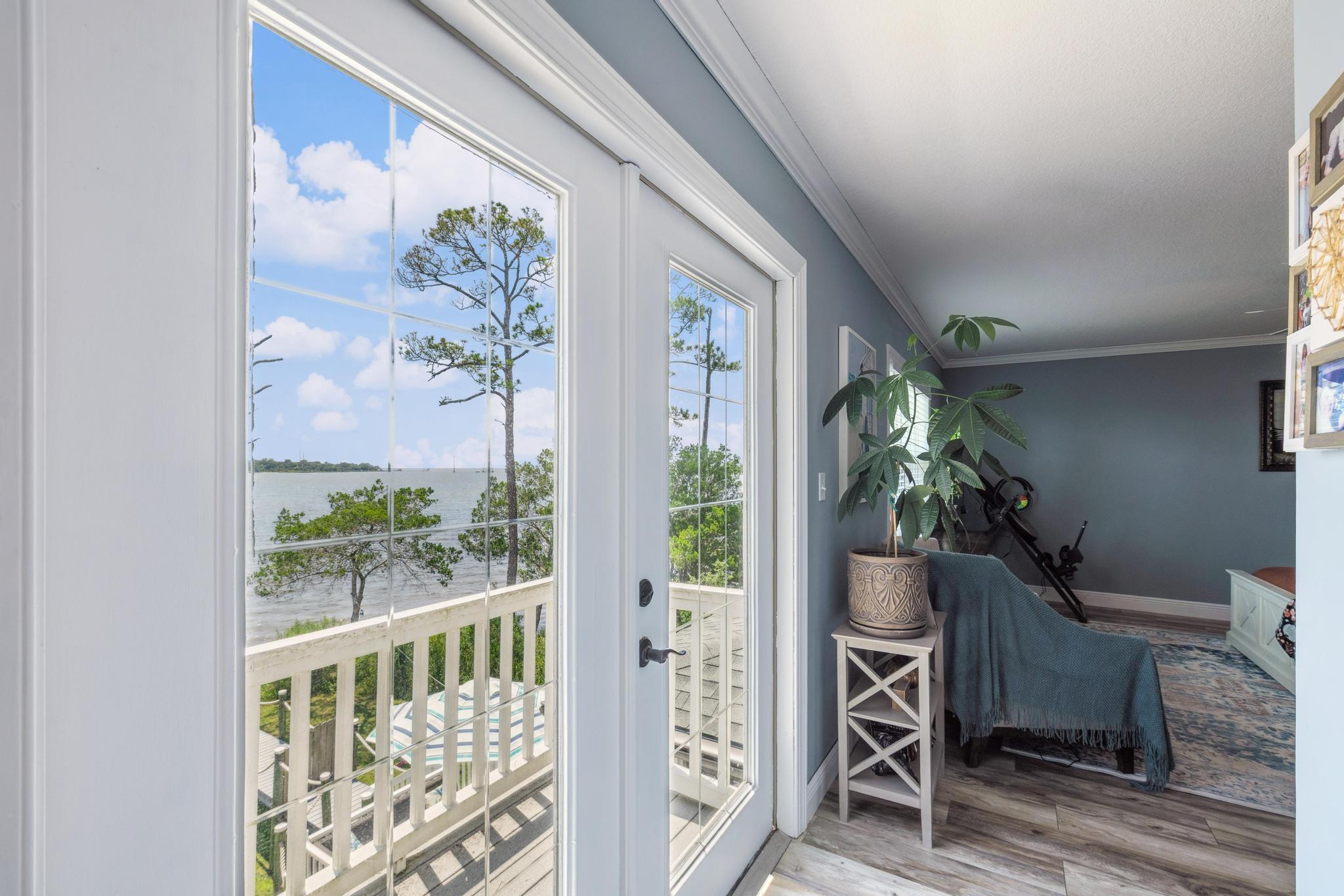 7121 Wells Avenue Navarre, FL 32566 - Photo 22 of 125 a view of a balcony with furniture