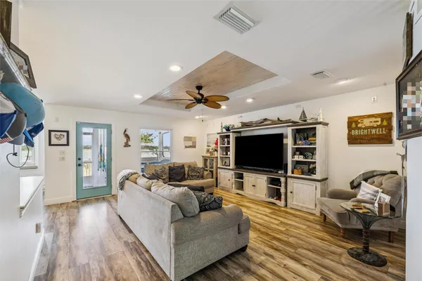 a view of a patio with a table and chairs